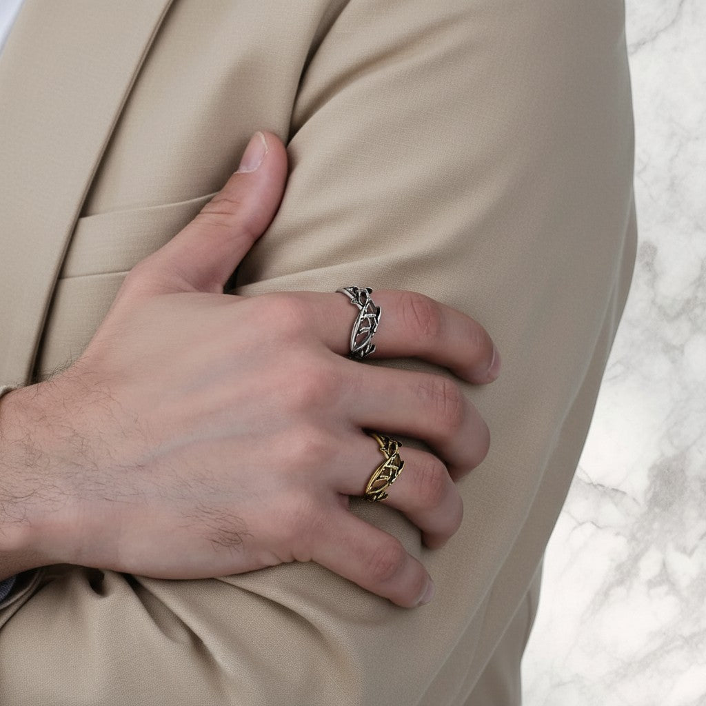 Champion of God Crown of Thorns ring in silver and gold tones, featuring an intricate vine-like design.