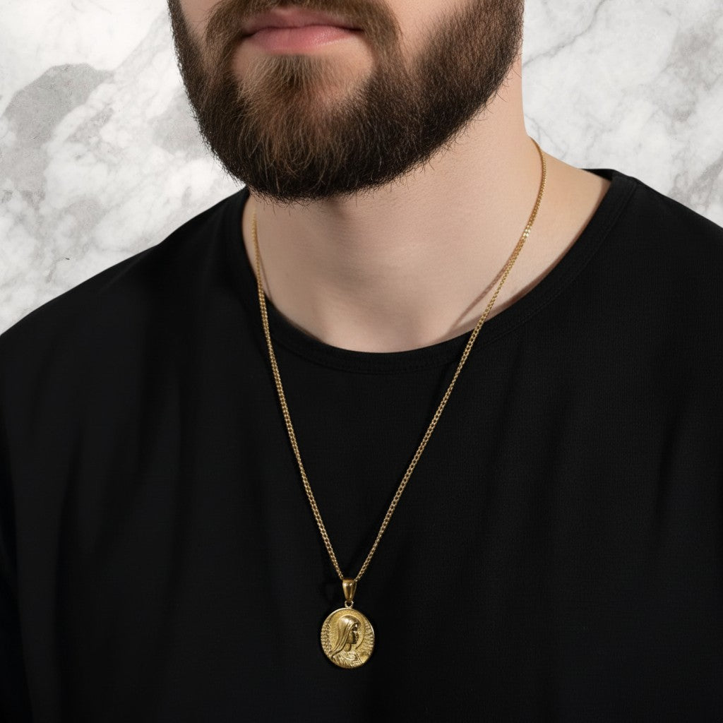Championofgod gold tone necklace with oval pendant featuring a relief of the Mother of God.