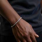 Championofgod 3mm silver rope chain bracelet on a person's wrist. The bracelet has a twisted rope design and is worn with a black t-shirt.